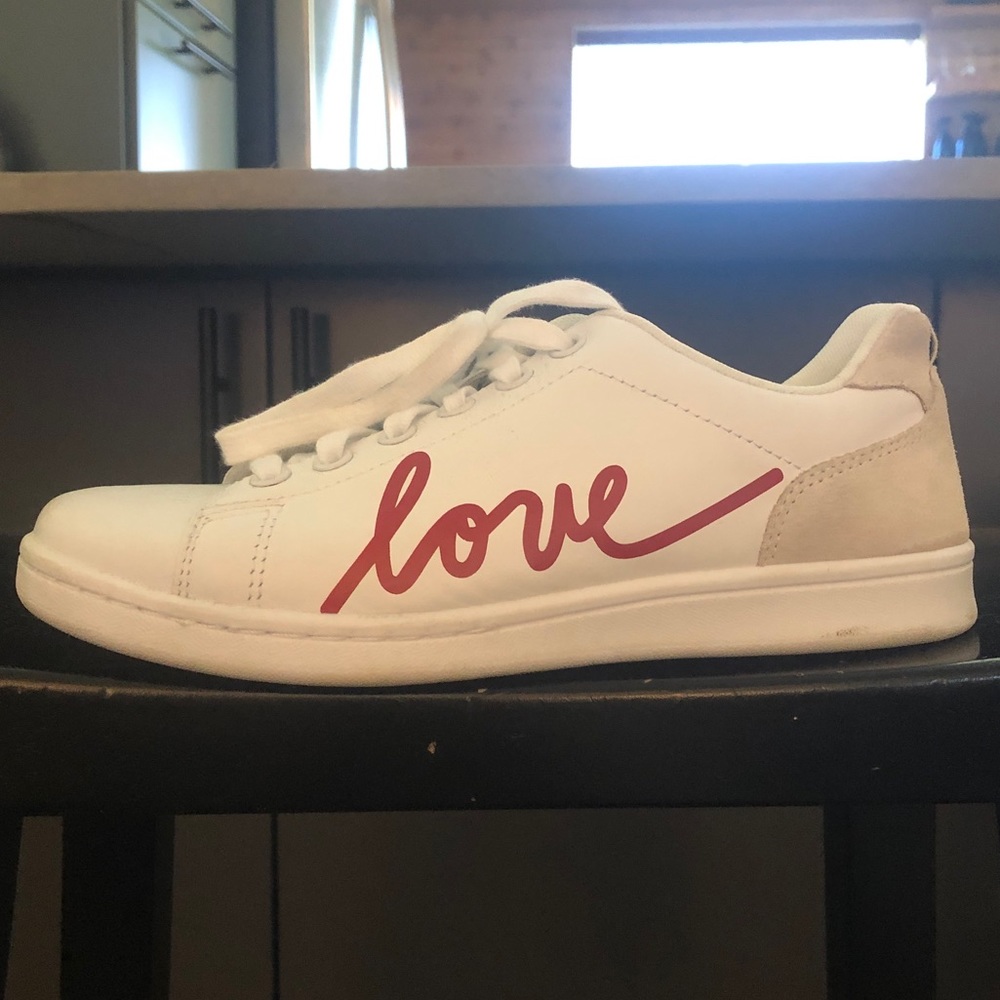 White “love” sneakers
